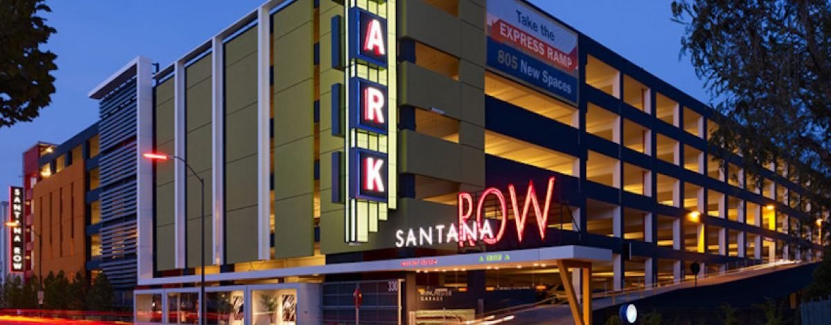 Completed parking structure illuminated at dusk